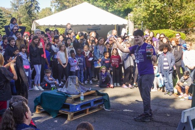 Henry Towbin, who studies magma at Lamont, shows visitors how a Plinian volcanic eruption happens, using Mentos candy and Coca-Cola. Photo: Phebe Pierson